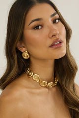 Noxelle Spiral Shell Earrings Gold