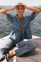 Natalia Peplum Tie Blouse In Light Wash Final Sale
